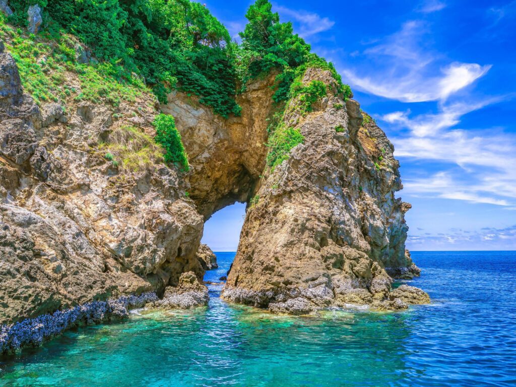 Natural hole clifff Koh talu island rayong city thailand,Idiyllic ocean and beautiful sky in vacation time,summer concept Stock Free