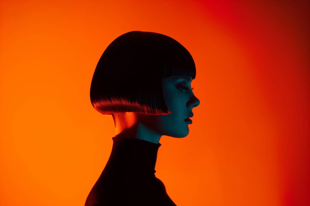 Professional Studio Portrait of a Girl With Orange Background Stock Free