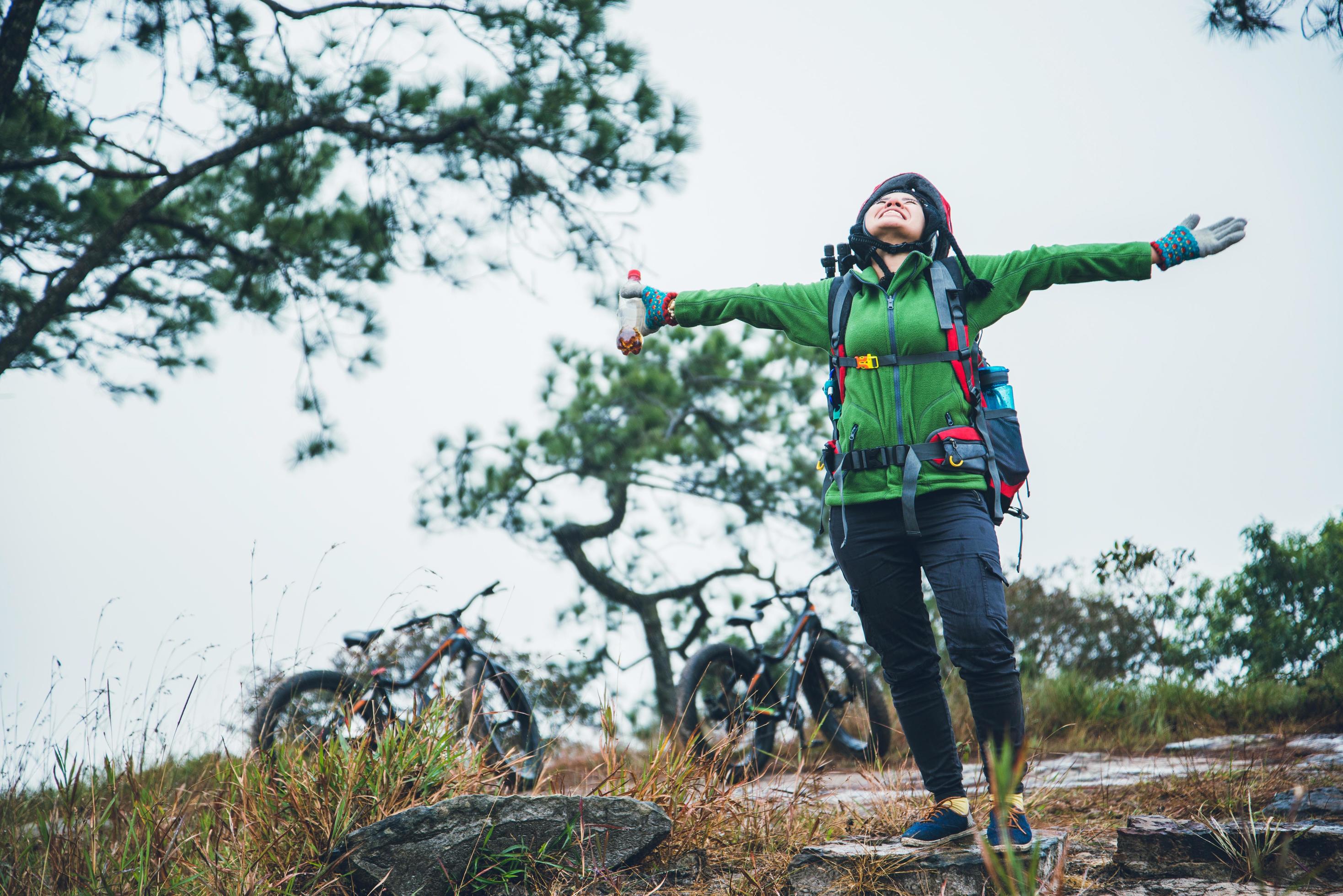 Asian woman Travel photograph Nature. Travel relax ride a bike Wilderness in the wild. Thailand Stock Free