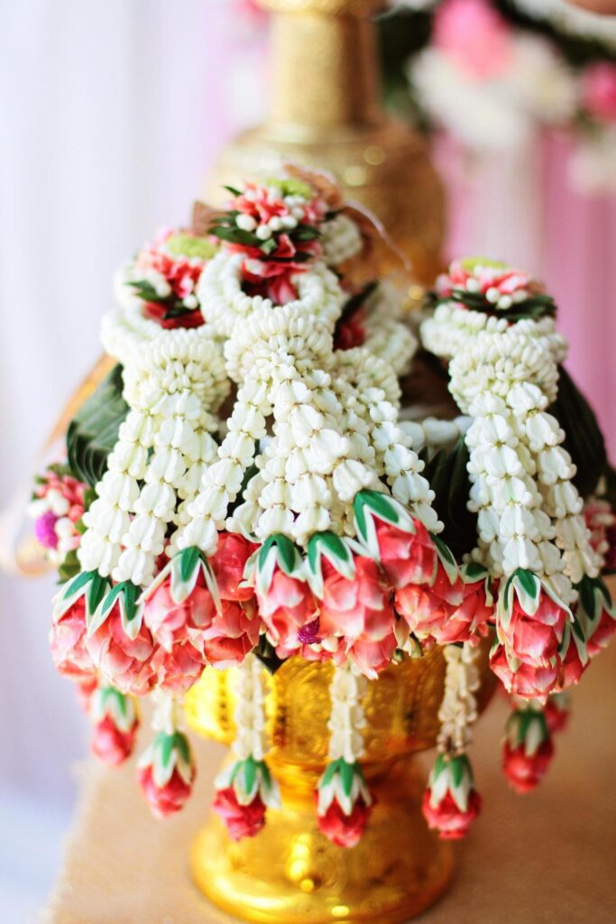 Flower garlands on a gold tray in tradition Thai wedding ceremony day. Jasmine garland. Stock Free