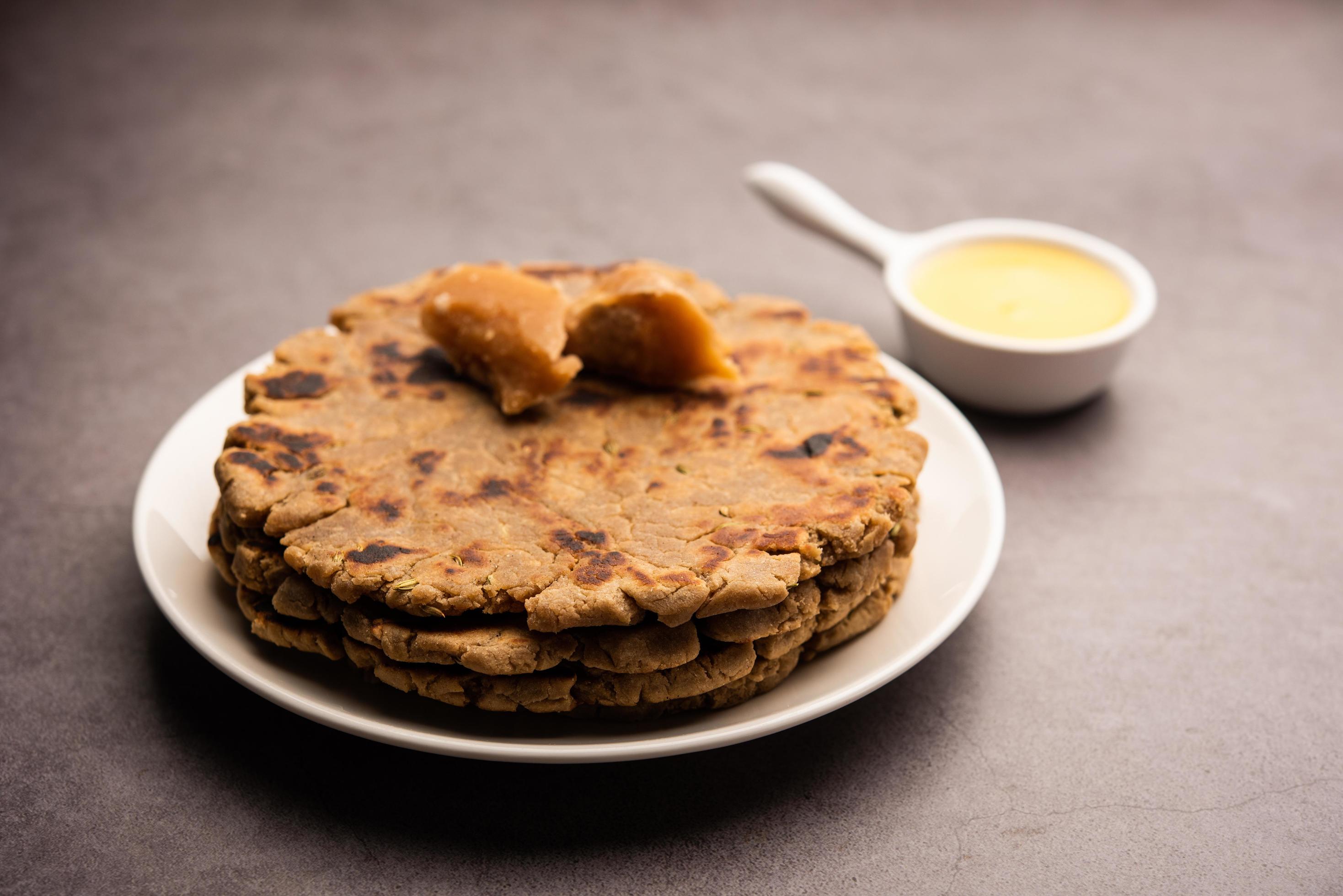 Sweet roti made out of rice flour, jaggery, and ghee. Gud ki roti. gur ki roti, jaggery Bhakri, meethi gud ki roti. Winter food. Copy space. Stock Free