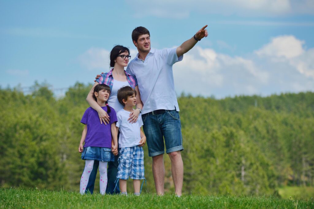 happy young family have fun outdoors Stock Free