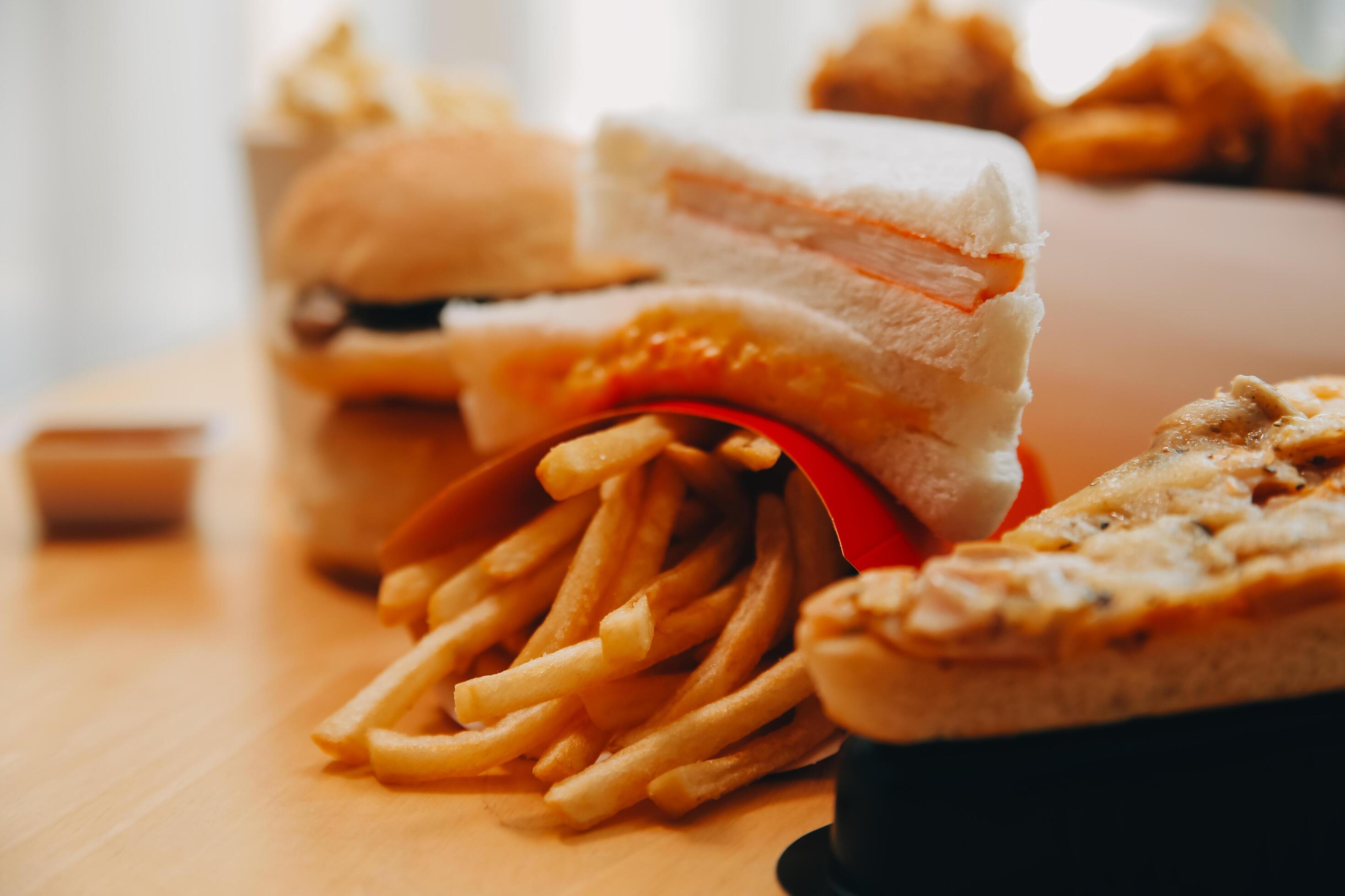 Closeup of home made burgers on wooden background Stock Free