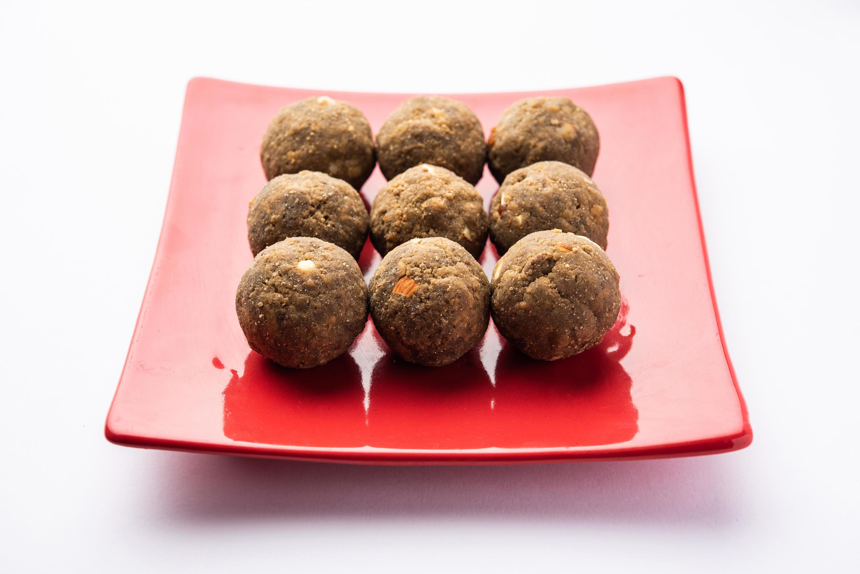 Bajra Atta Ladoo or kuler laddoo – Millet Flour Laddu, a popular winter sweet snack food from India Stock Free