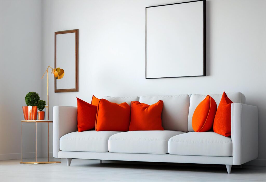 Interior of modern living room with white sofa and orange pillows Stock Free