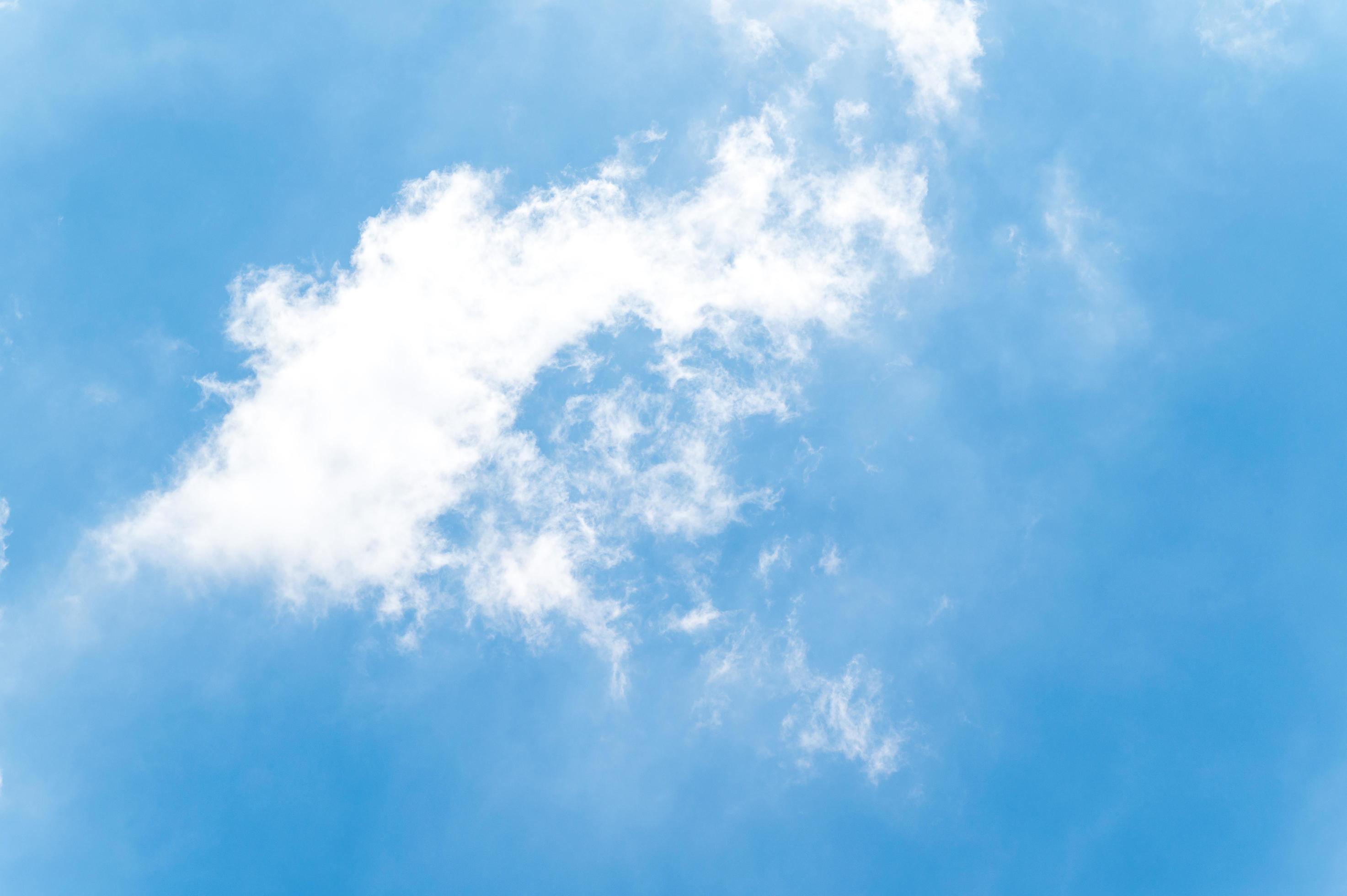 Beautiful white fluffy clouds in blue sky. Nature background from white clouds in sunny day Stock Free