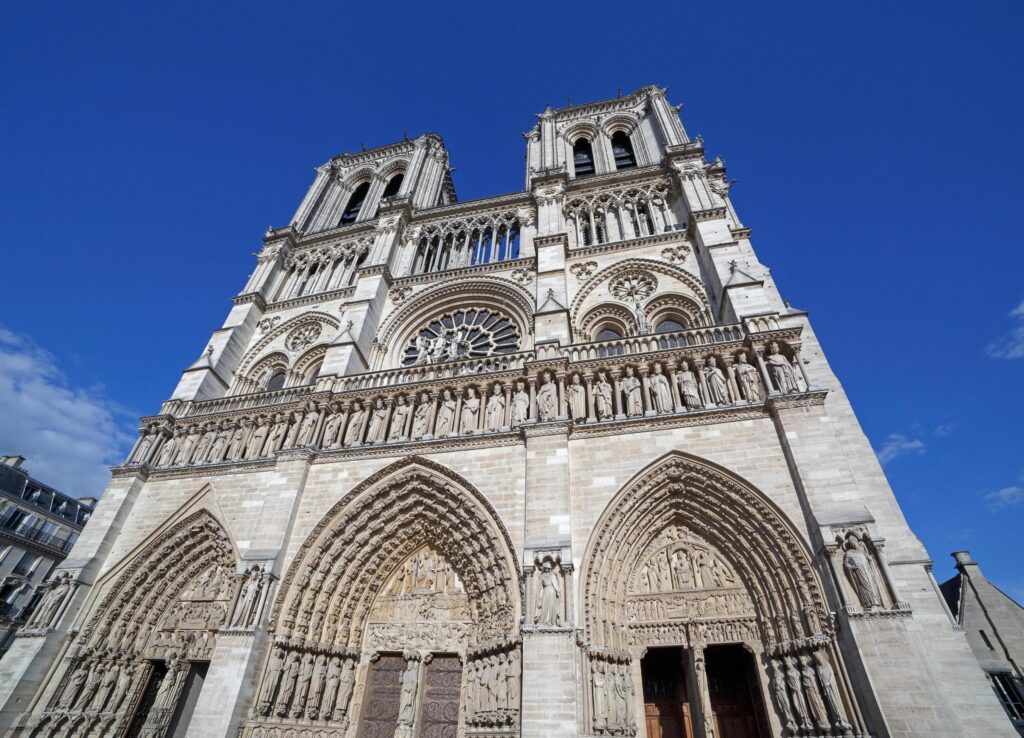 view on front side of Notre-Dame de Paris cathedral in Paris at summer day Stock Free