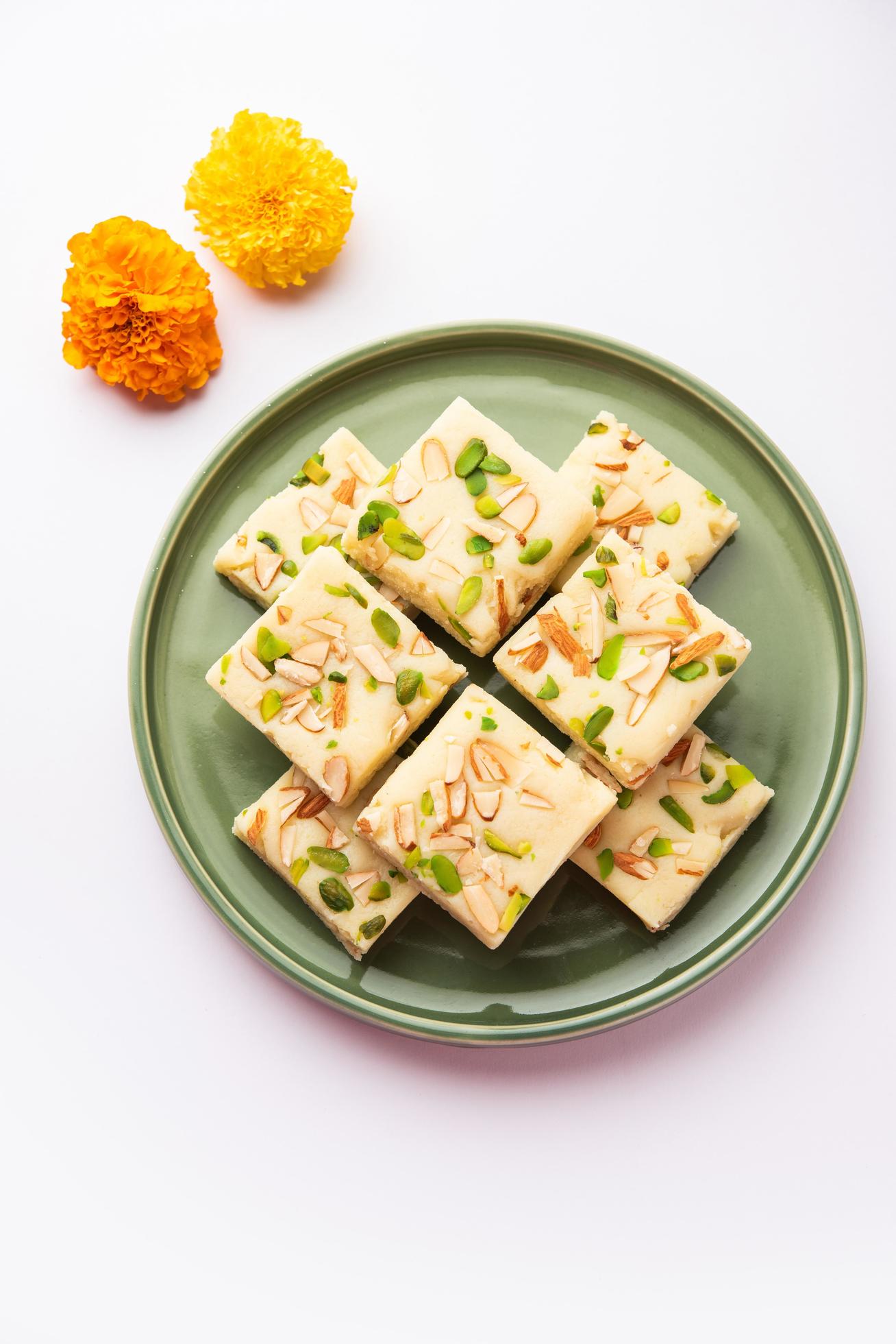 Milk powder barfi also known as Mava burfi, white Khoya burfi or Barfee, Indian Sweet food Stock Free