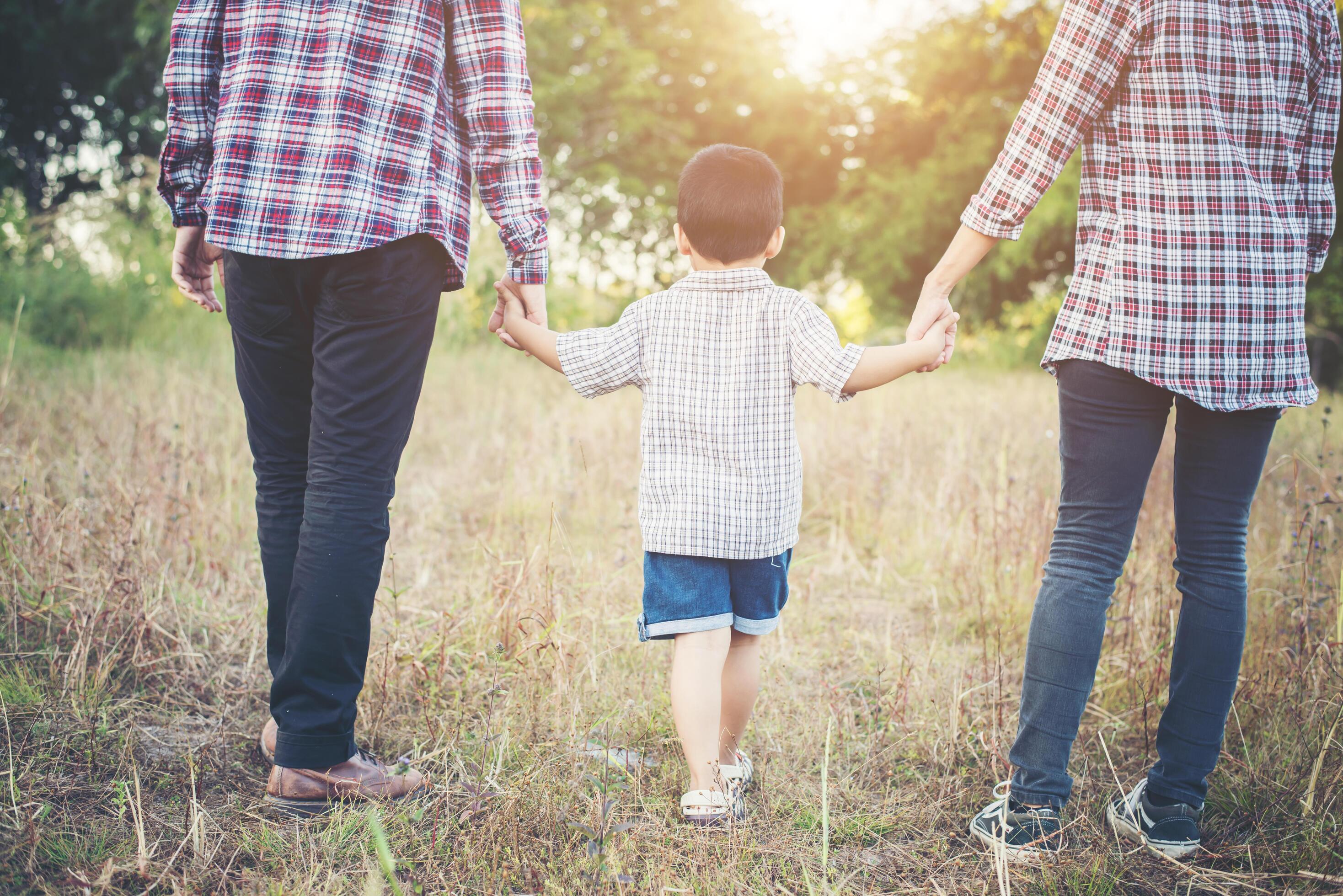 Young family spending good time together. Family outdoors in love. Stock Free