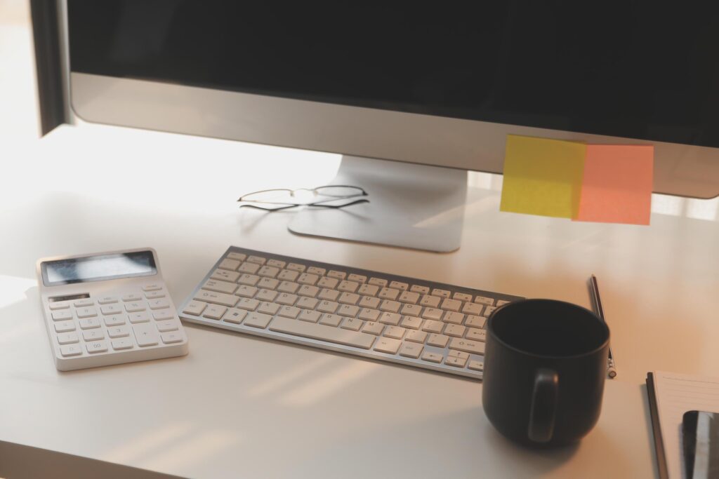 messy office workspace. Messy and cluttered office desk. Messy business office with piles of files and disorganized clutter. Stock Free