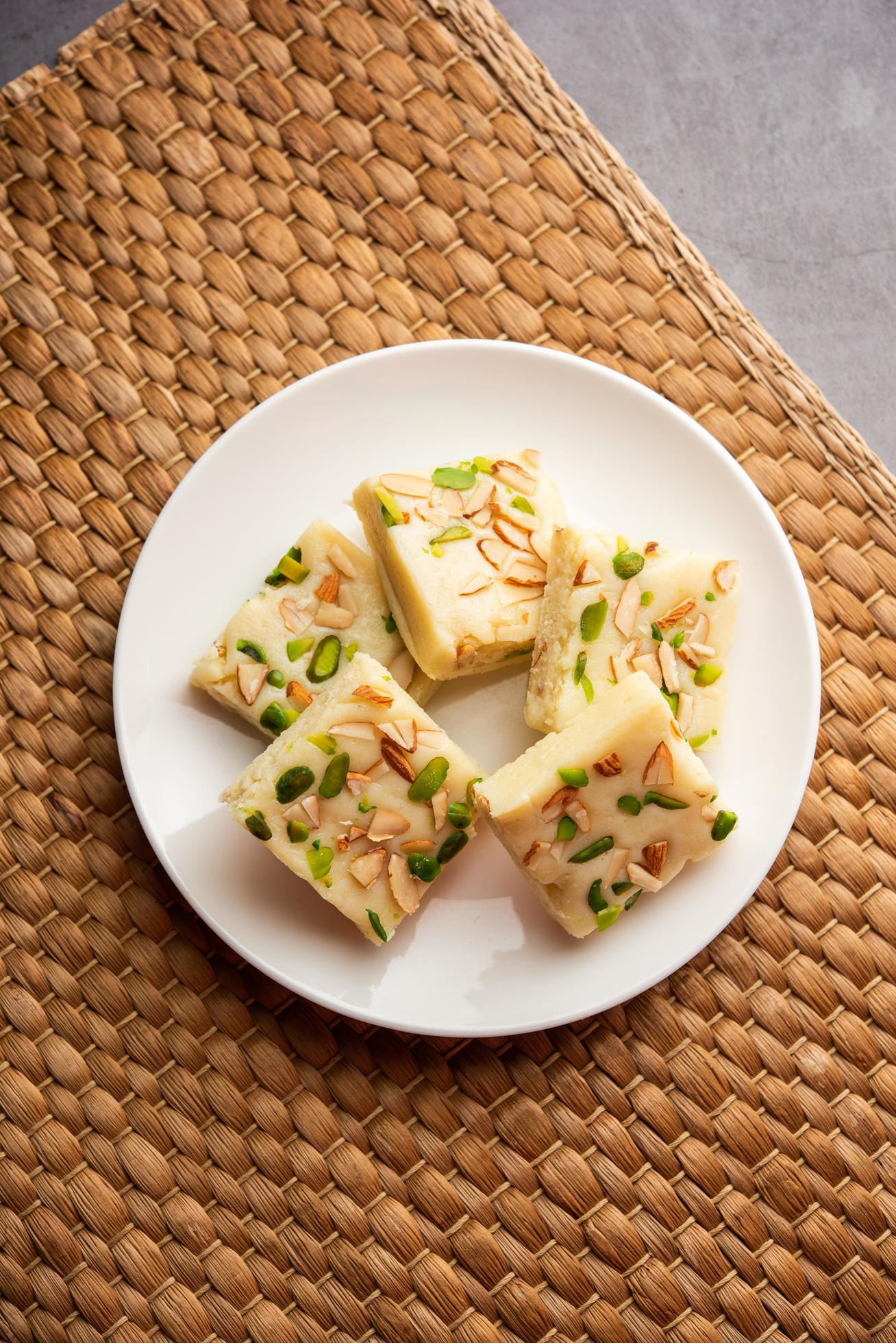 Milk powder barfi also known as Mava burfi, white Khoya burfi or Barfee, Indian Sweet food Stock Free