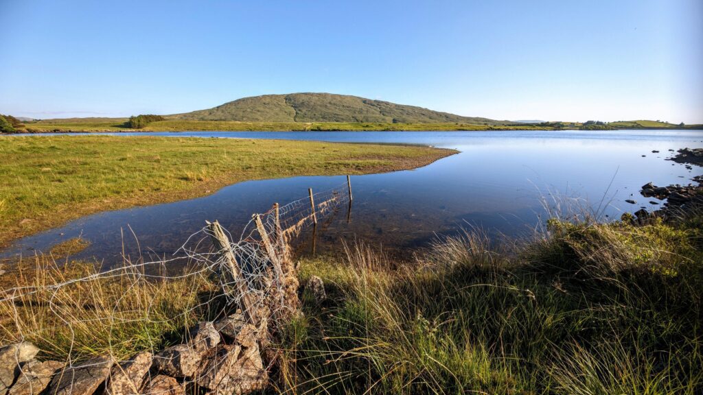 Landscape scenery, lake and green mountain in background at Connemara national park, Galway, Ireland, wallpaper Stock Free