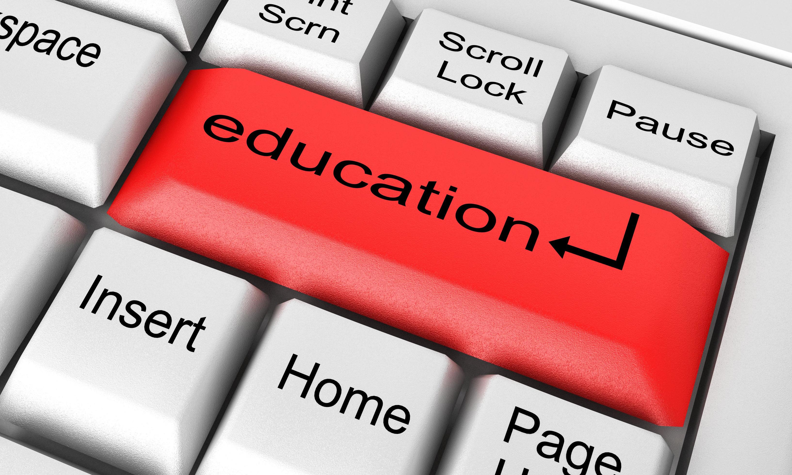 education word on white keyboard Stock Free