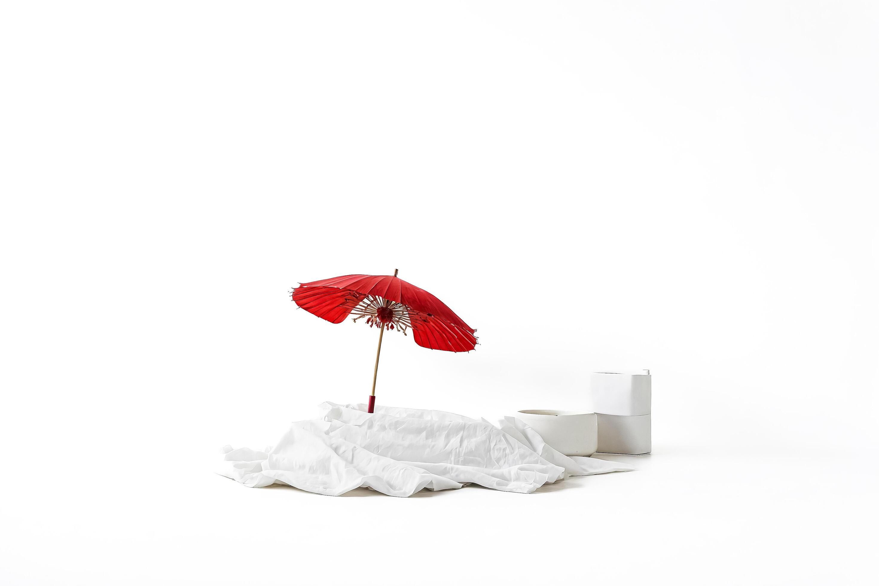 Red Umbrella on White Fabric and White Background Stock Free