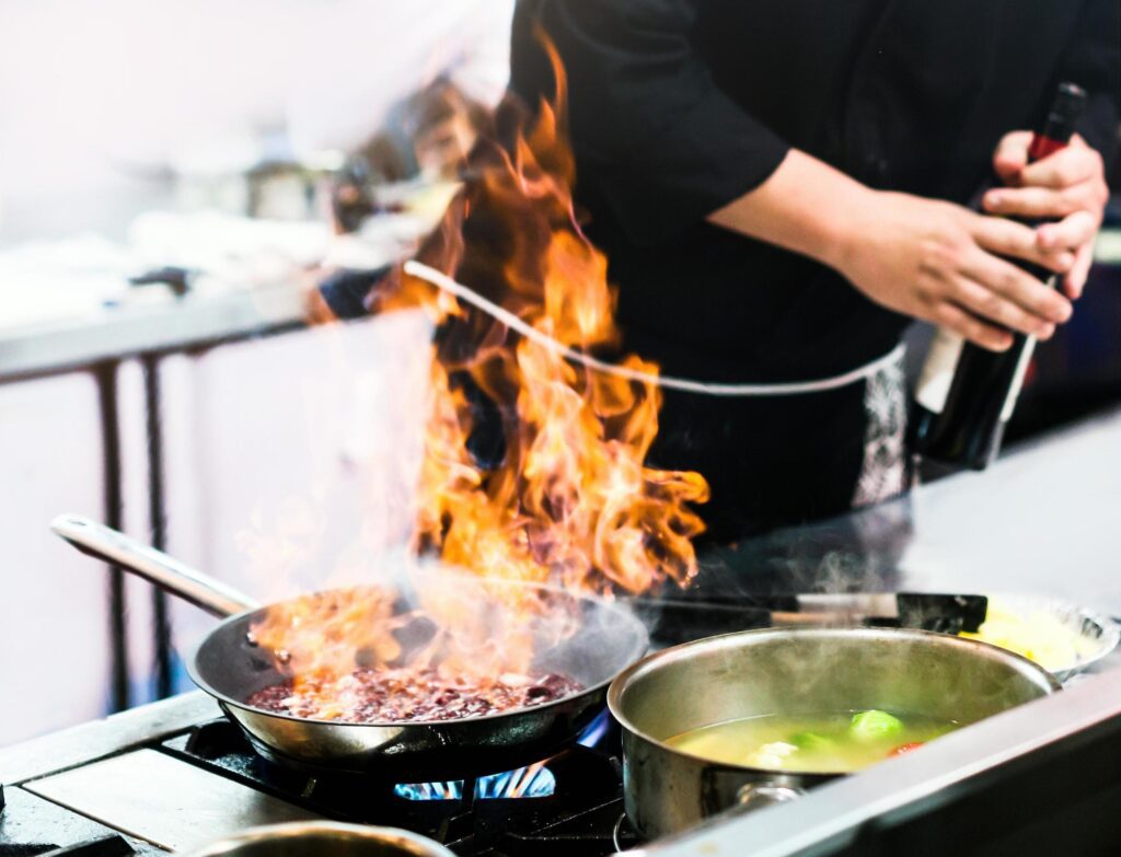 Chef cooking, Chef preparing food in the kitchen Stock Free