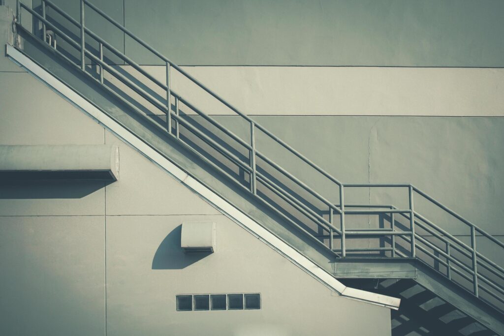 Fire escape ladder on the side of building Stock Free