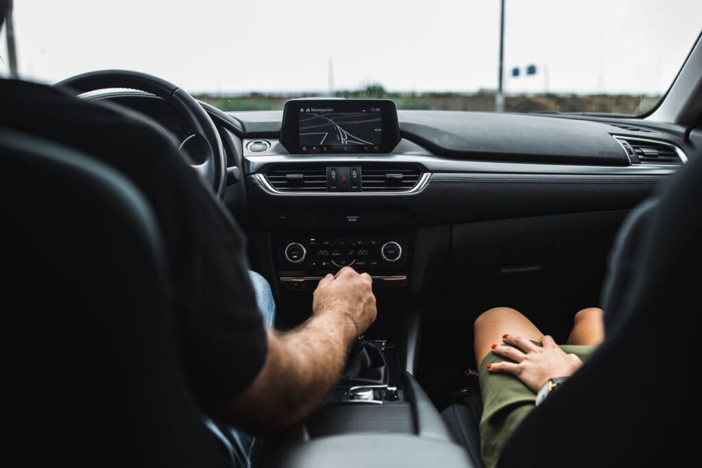 Couple travelling by car Stock Free