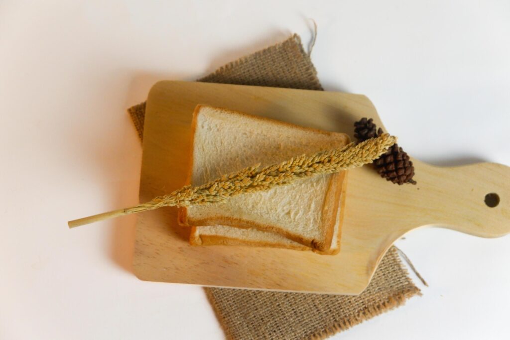 photography of bread with wheat on a white background Stock Free