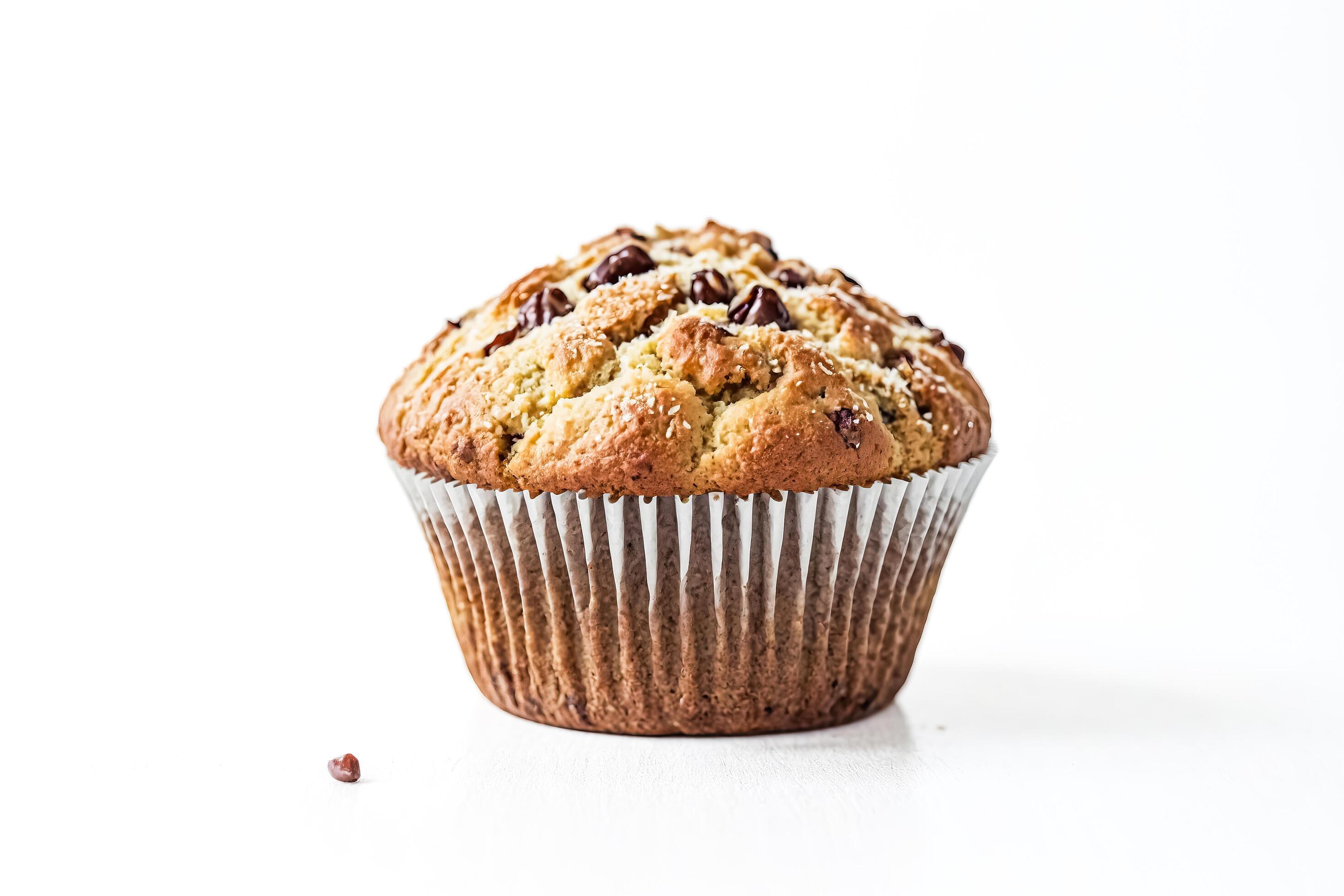 Close-up of a Chocolate Chip Muffin on a White Background Stock Free