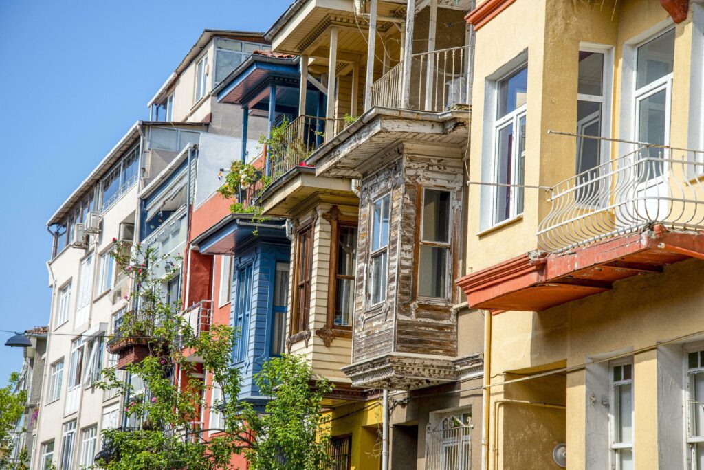 Cobblestone alley, with beautiful old colorful traditional wooden houses on the side, suited in Fatih district, Istanbul. Stock Free