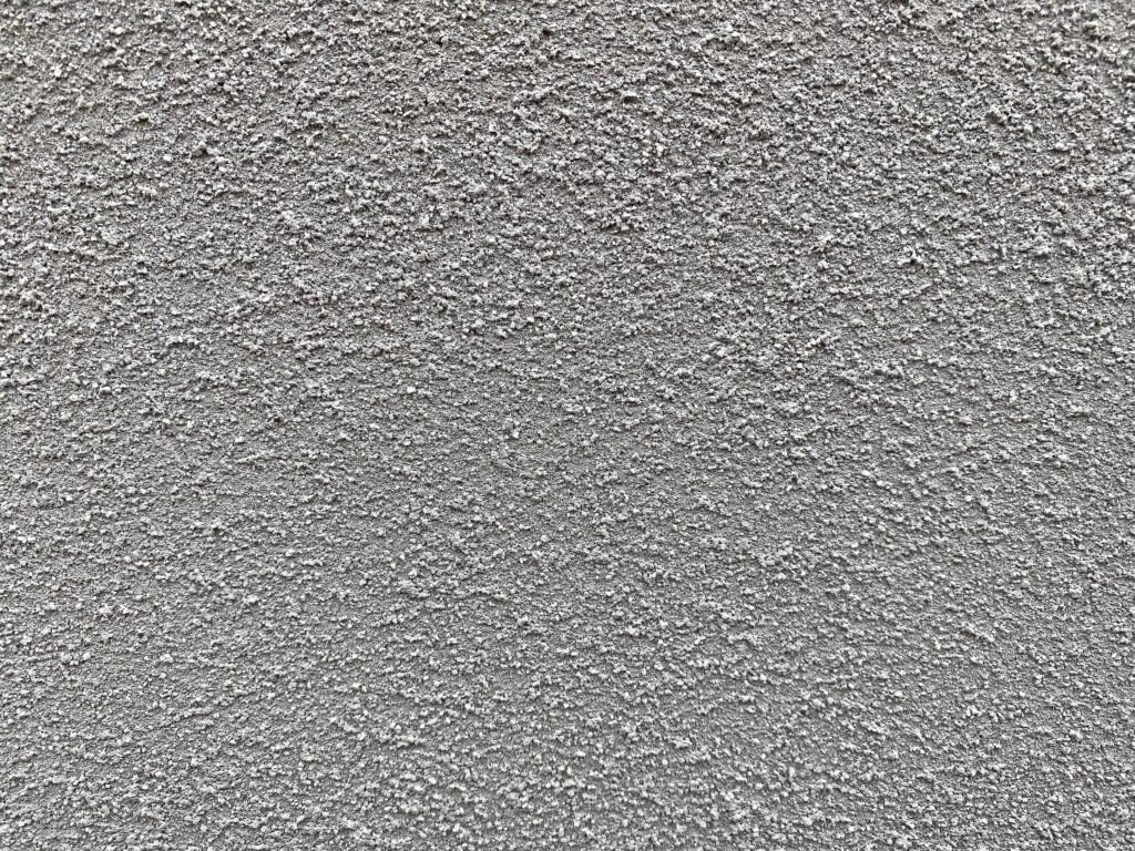 close up of gray stony wall background Stock Free