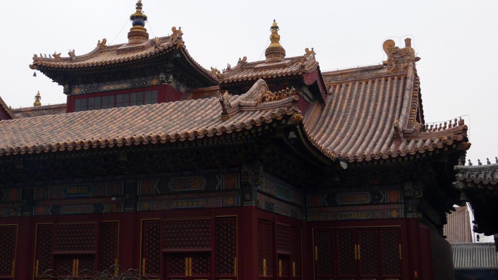 Traditional Chinese temple architecture, ancient house facade with ornamental roof Stock Free