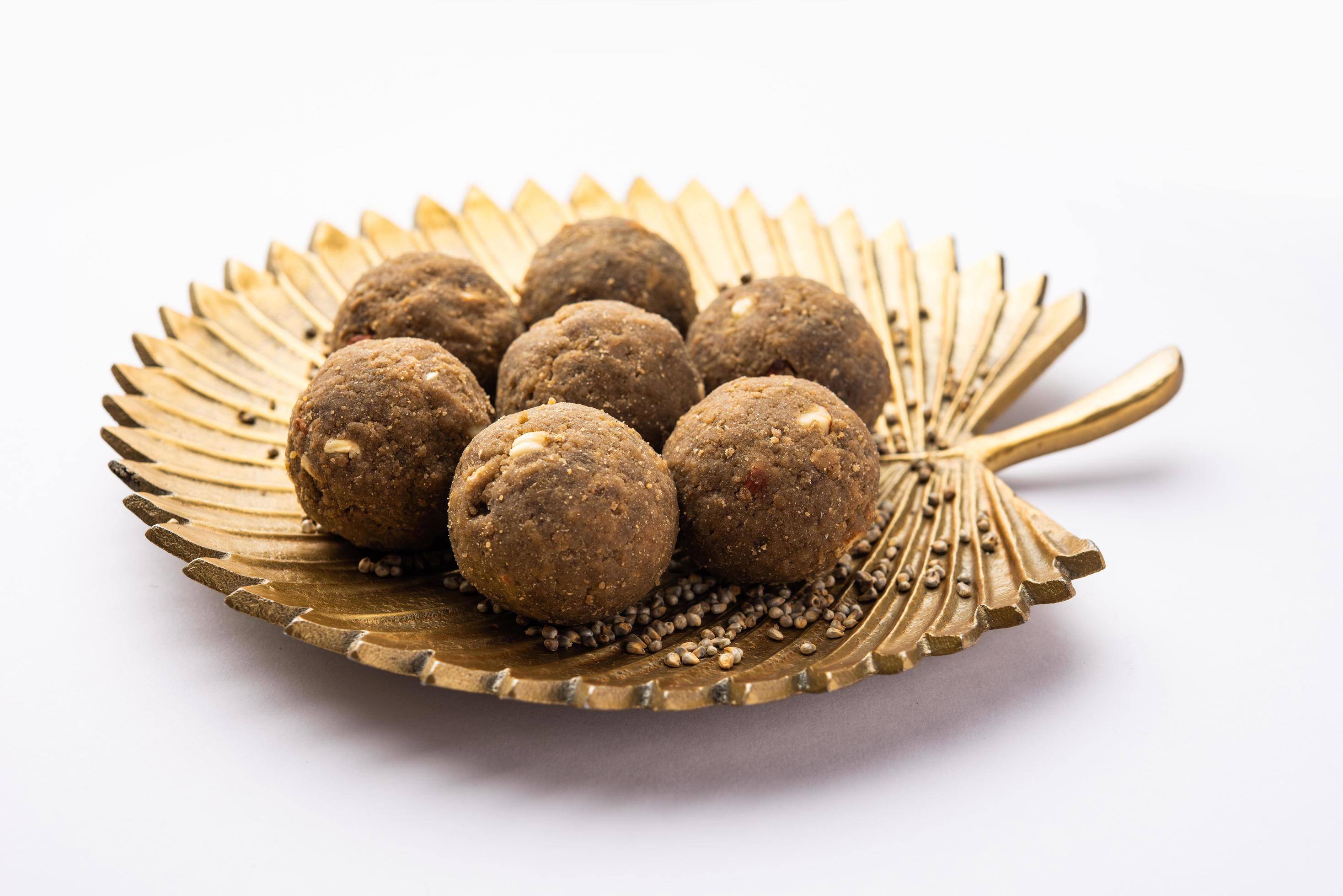 Bajra Atta Ladoo or kuler laddoo – Millet Flour Laddu, a popular winter sweet snack food from India Stock Free