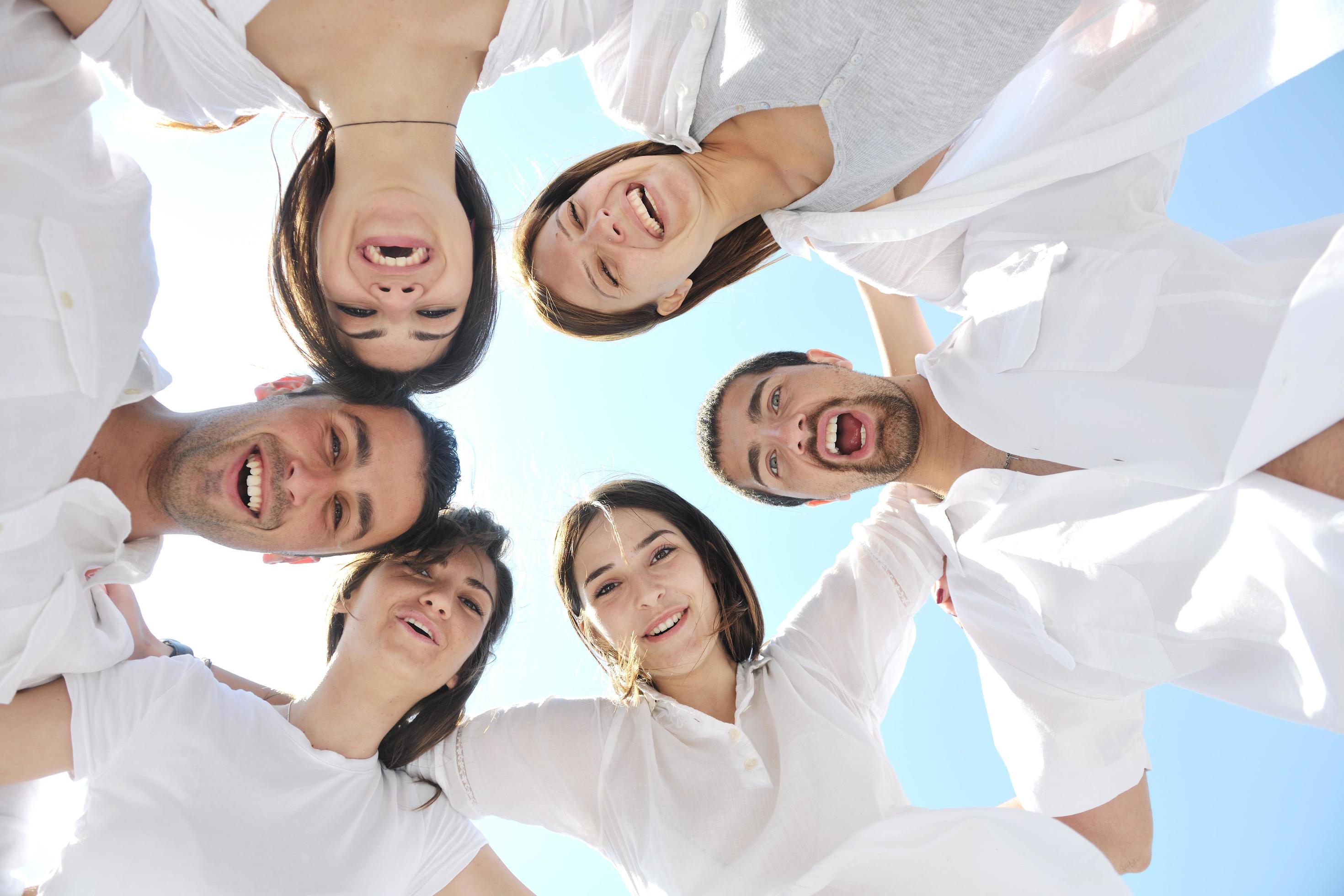 Group of happy young people in have fun at beach Stock Free