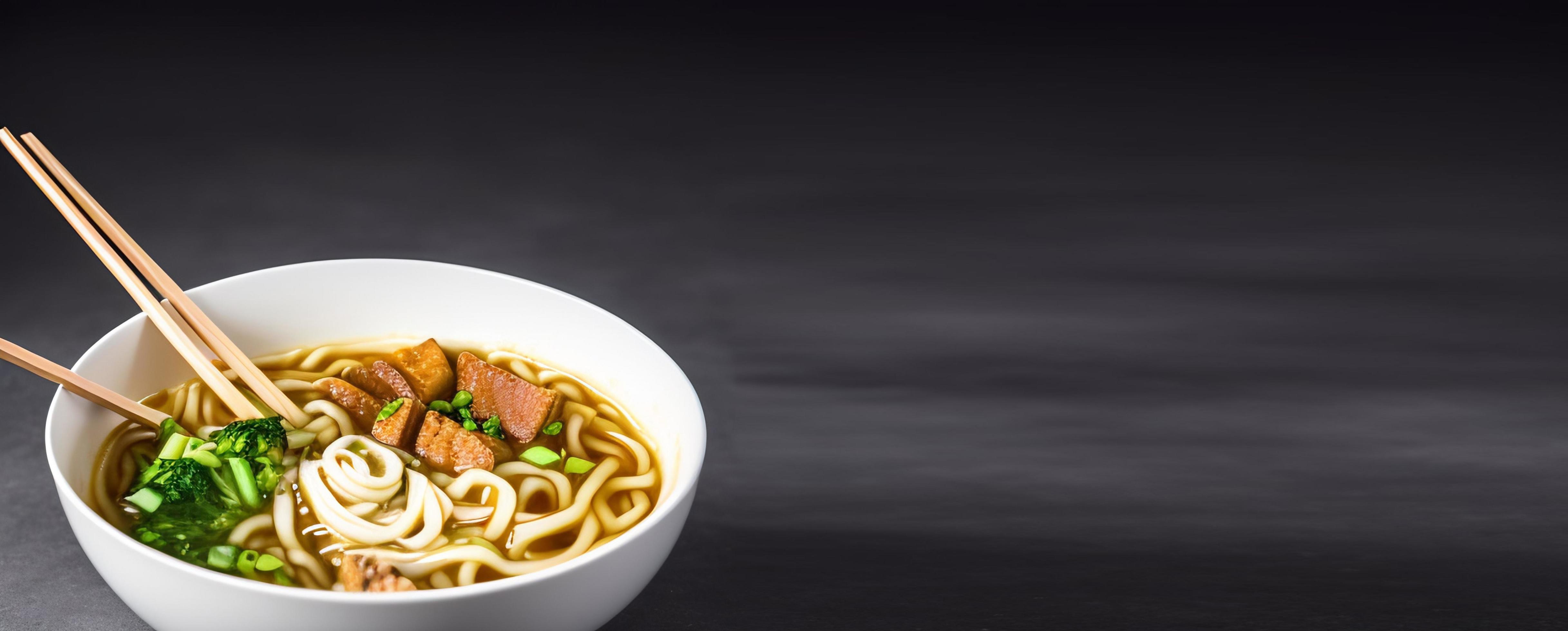 Delicious noodles. Fast food meal with appetizing pasta and chopsticks. Stock Free