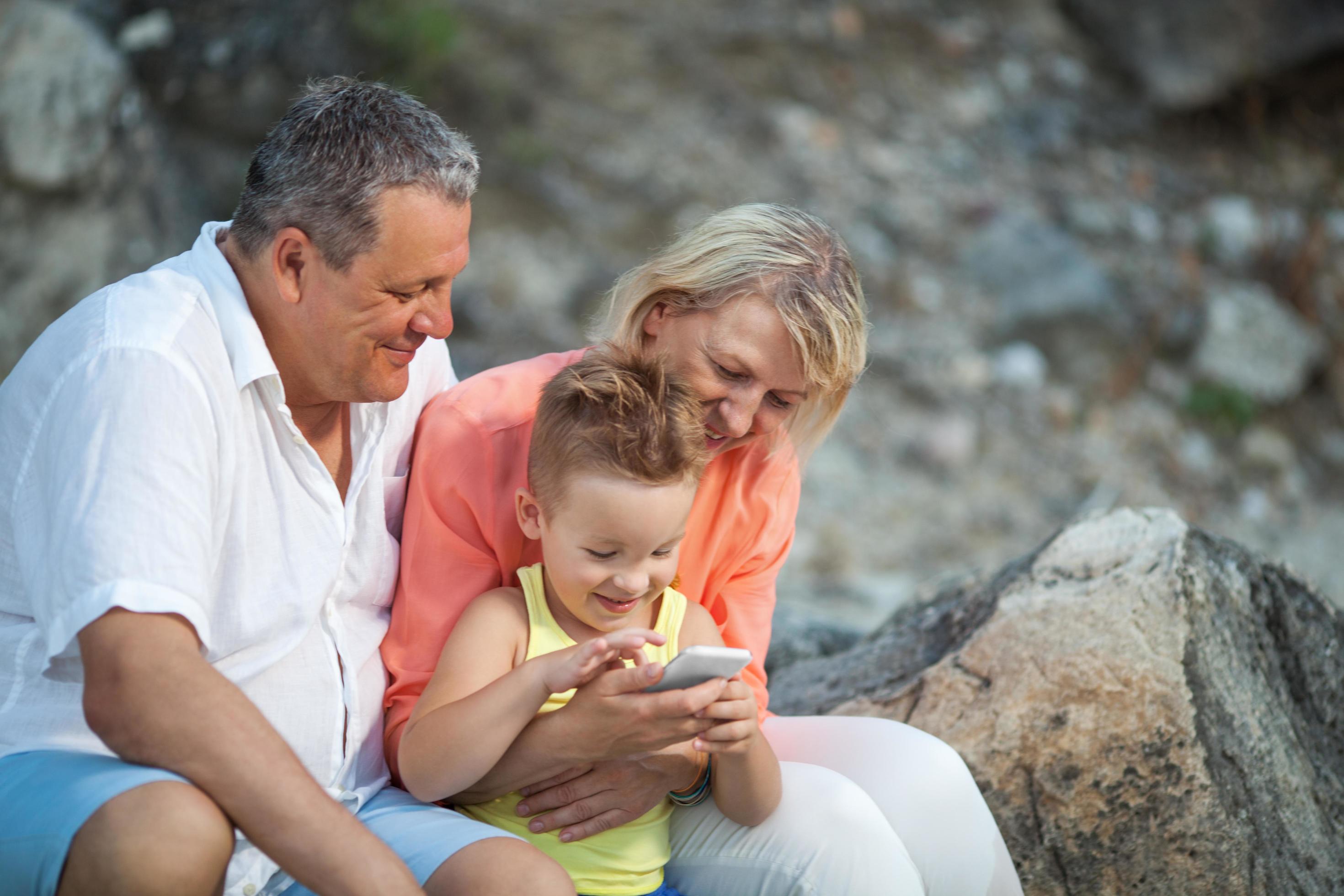 Grandparents with grandson Stock Free