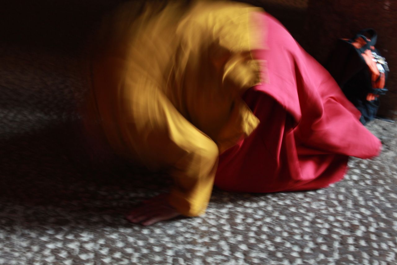 Blurry Picture Of Monk Praying Stock Free