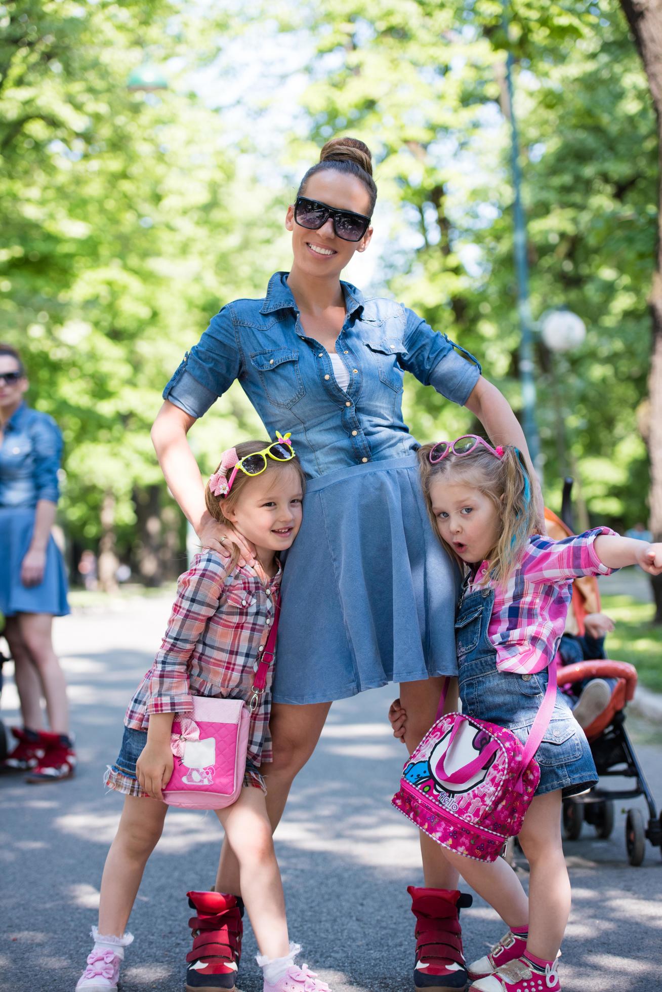 mother with her daughters in the park Stock Free