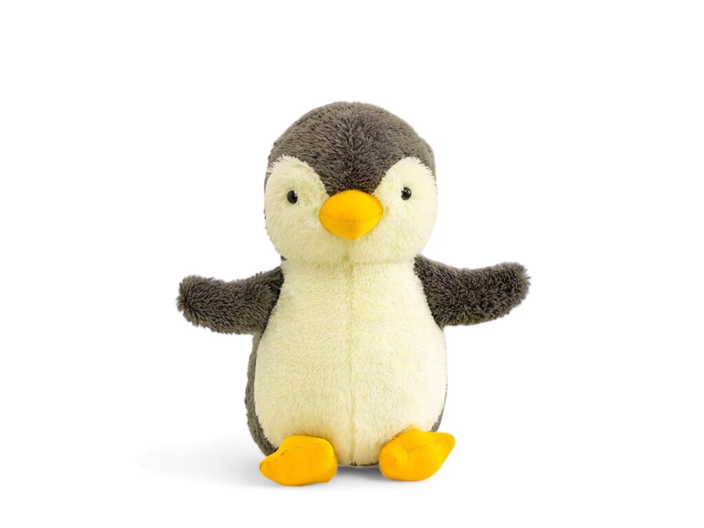 penguin doll on a white background Stock Free