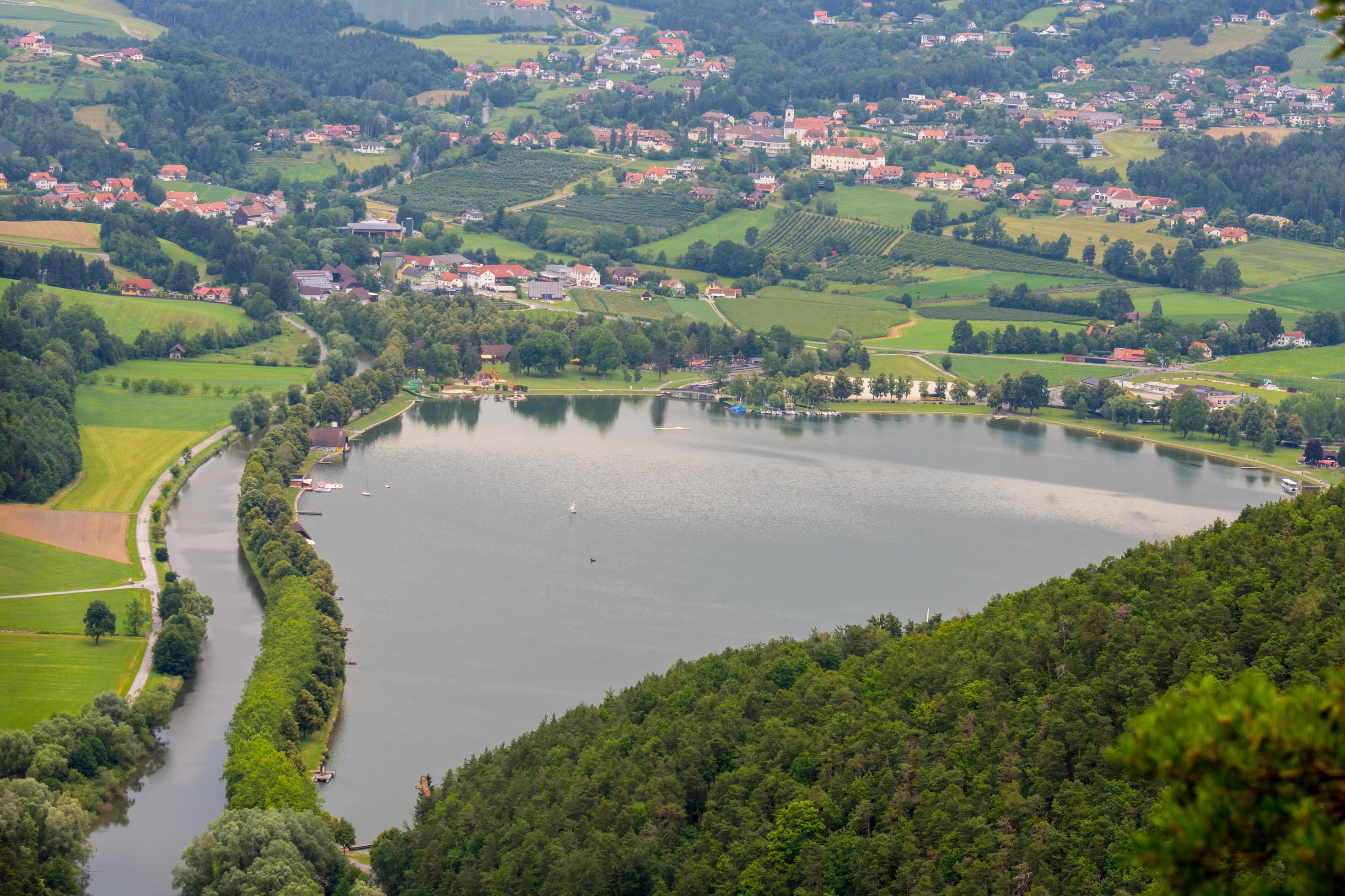 wonderful lake in the green nature with houses above Stock Free