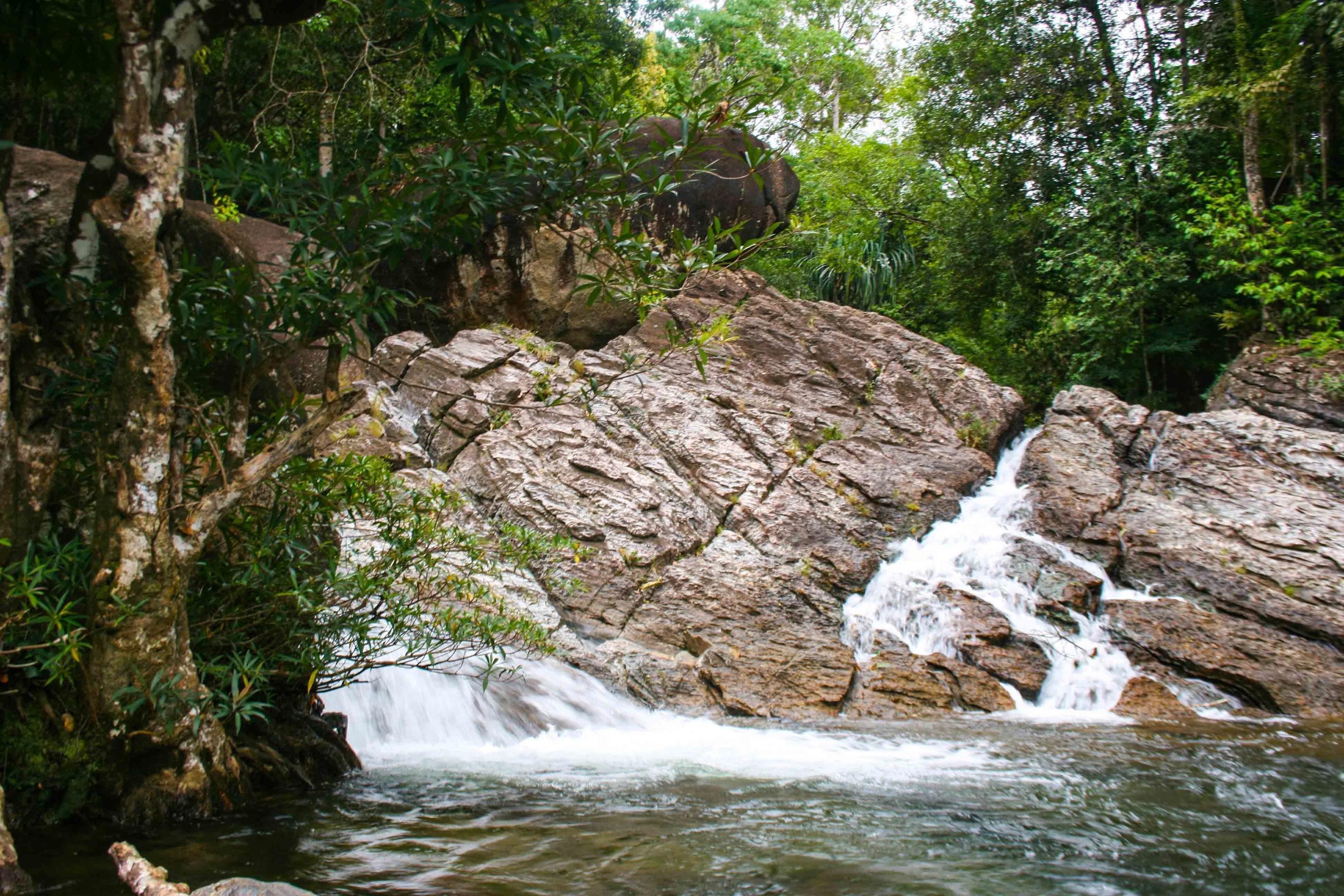 Big stone rock and waterfall beauty nature in south Thailand 2 Stock Free