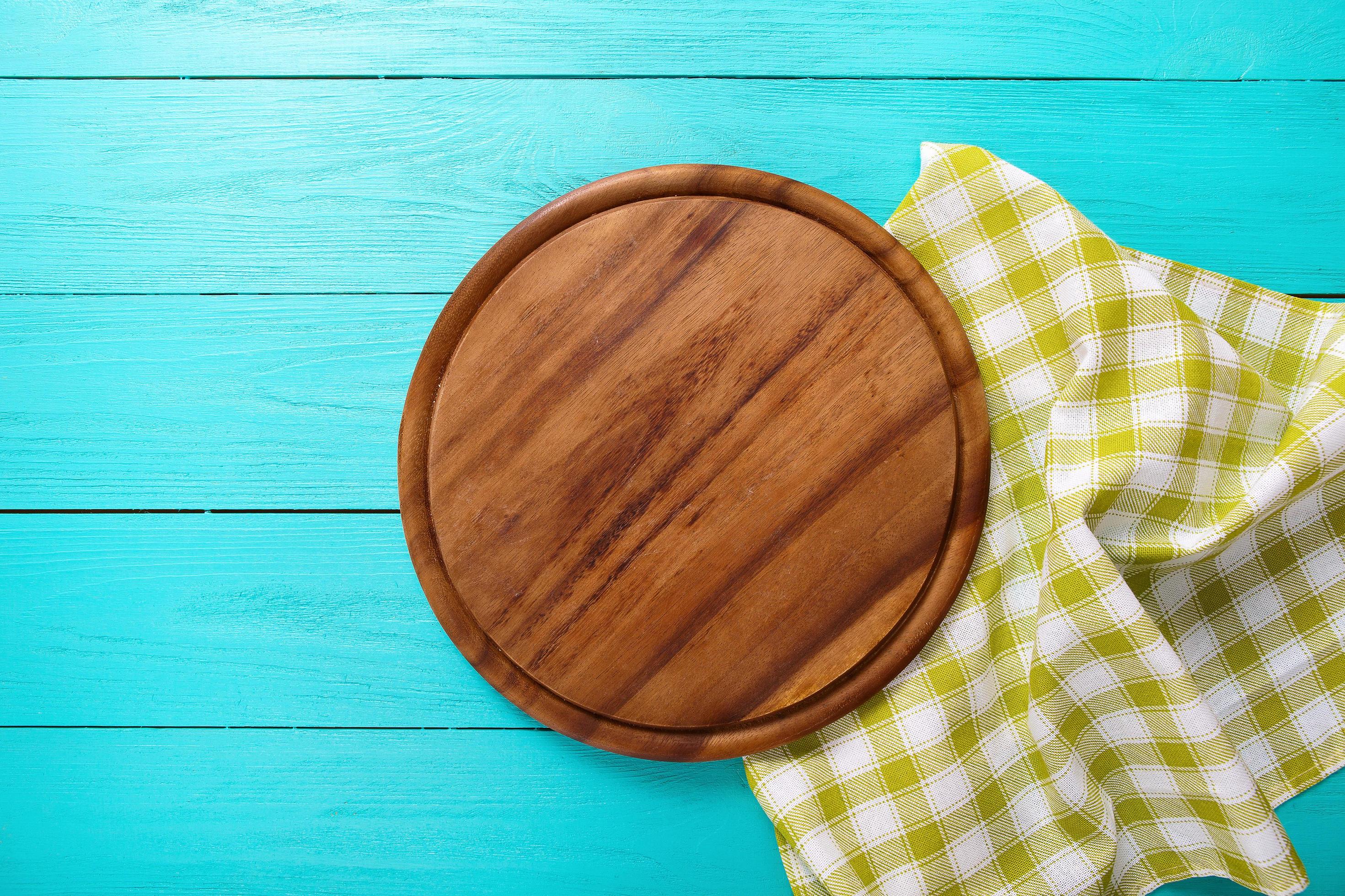 wooden table top view, desk for pizza with coloured napkins. Holiday, food concept Stock Free