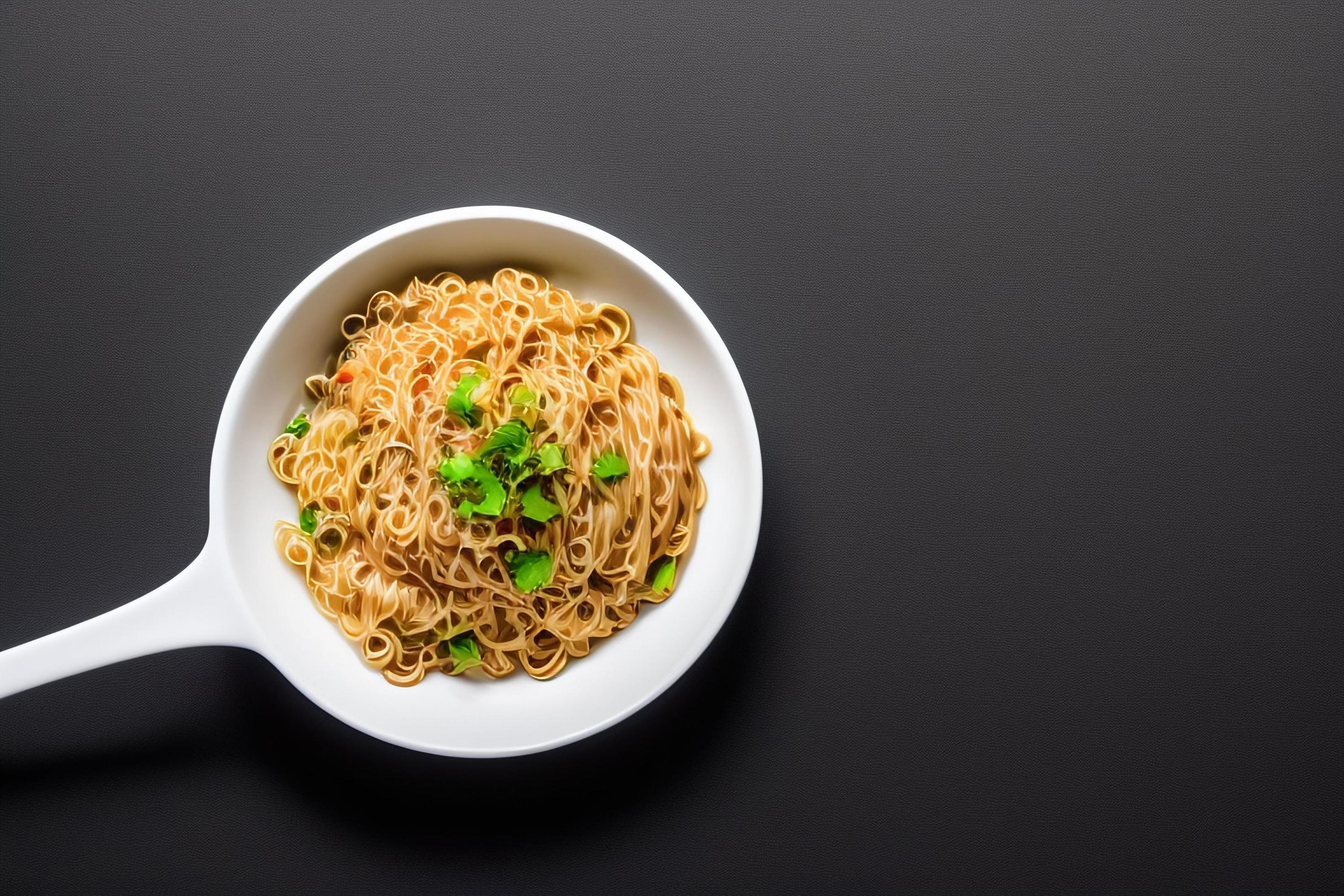 Delicious noodles. Fast food meal with appetizing pasta and chopsticks. Stock Free