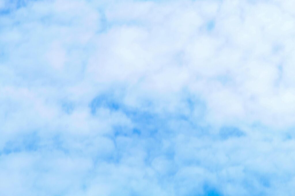 White clouds on blue sky, wallpaper and pattern background Stock Free