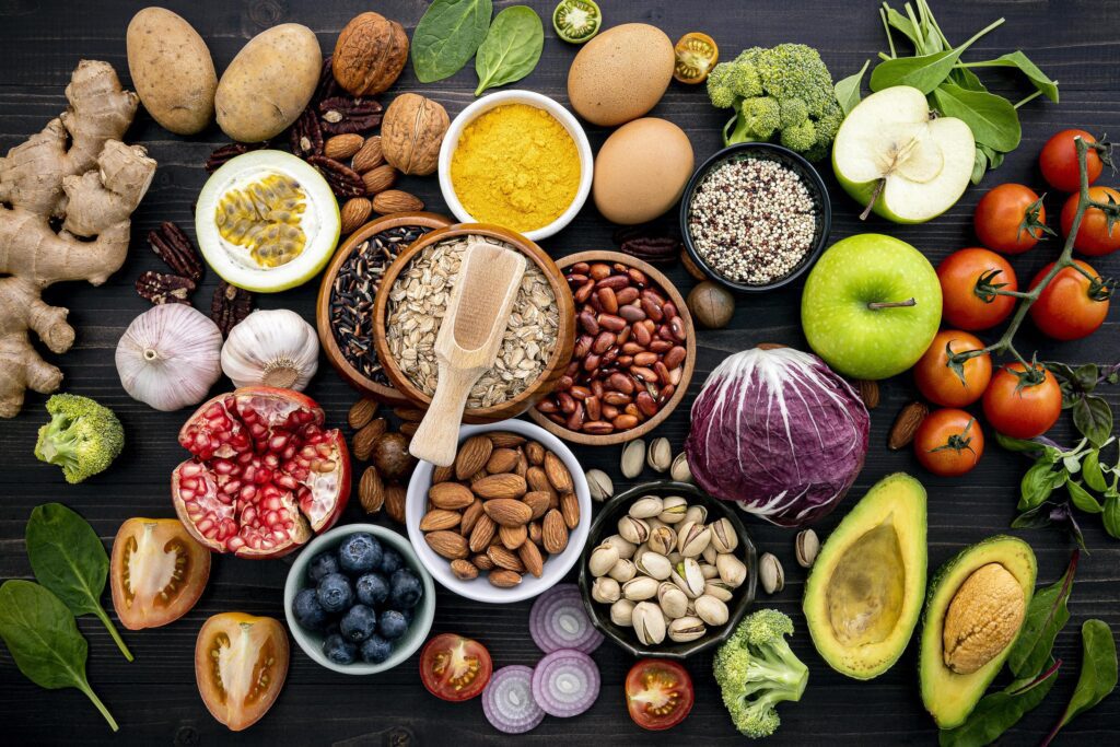 Pile of healthy food on a dark background Stock Free