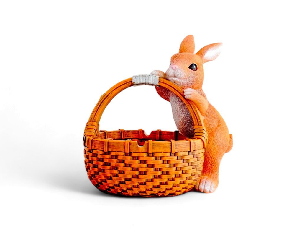 Decorated miniature squirrel with basket on white background Stock Free