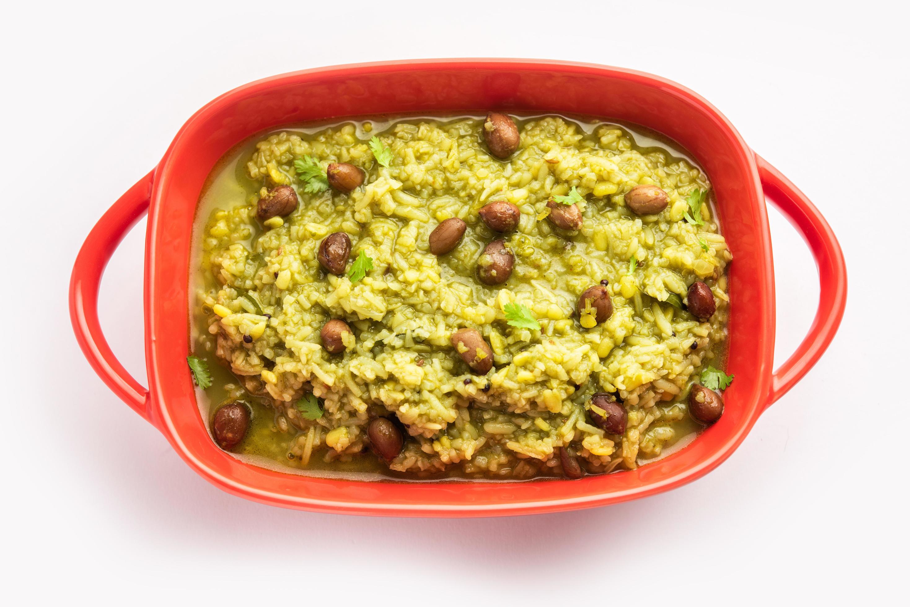 Palak khichdi is a one pot nutritious meal of mung lentils and rice with spinach, Indian food Stock Free