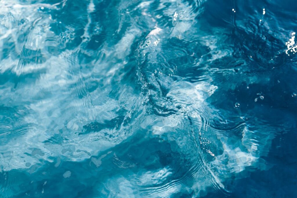 Wavy water surface in a swimming pool Stock Free