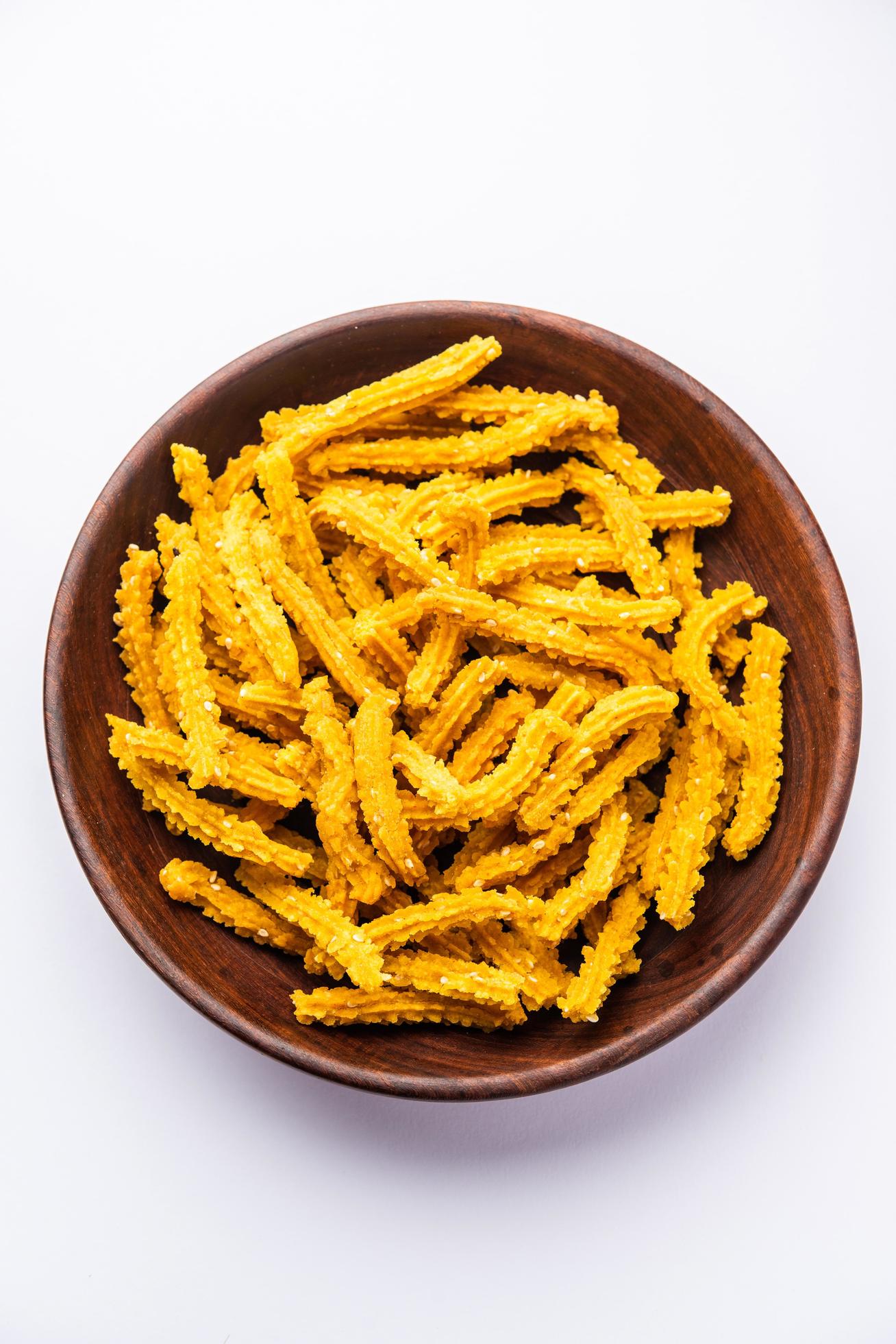 Bhajni chakli sticks or crunchy murukku snack made using diwali festival, favourite munching food Stock Free