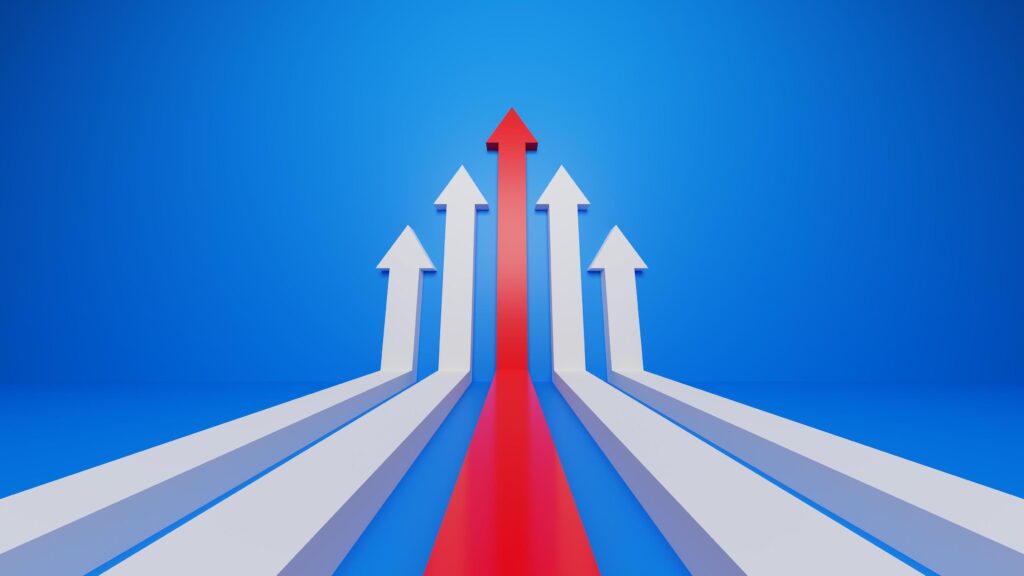 Leader Red arrow leading white arrow on blue background. Teamwork, Cooperation, Business Partner, Leadership concept Stock Free