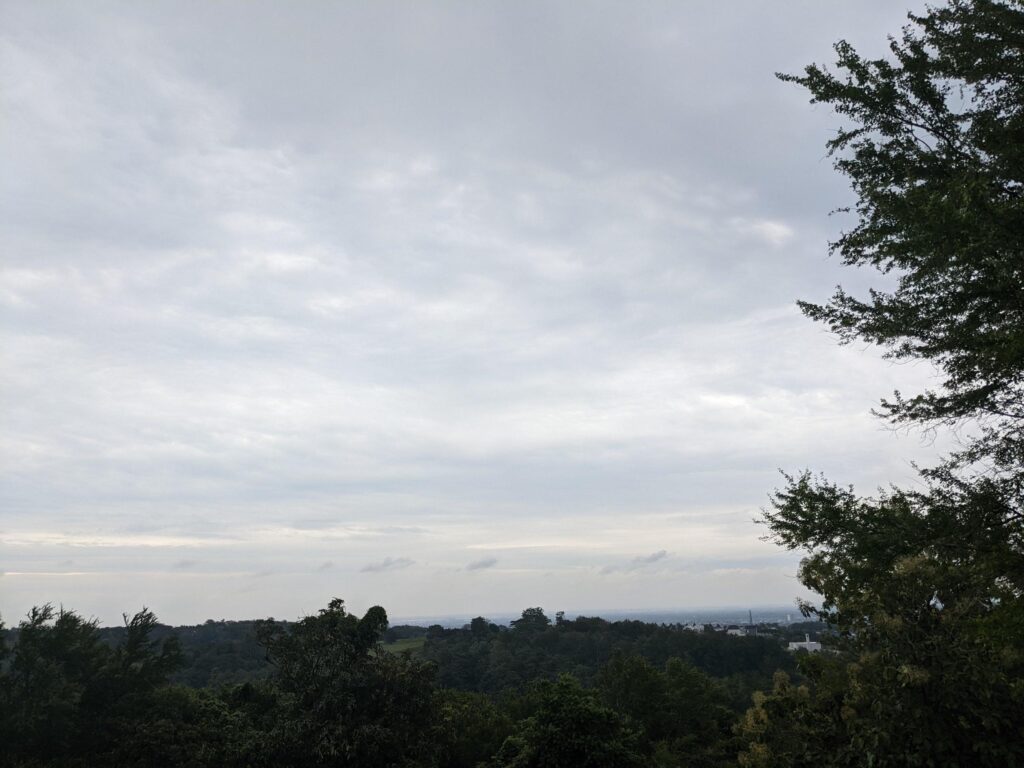 Landscape of hilltop with cloudy vibes when rain season. The photo is suitable to use for environment background, nature poster and nature content media. Stock Free