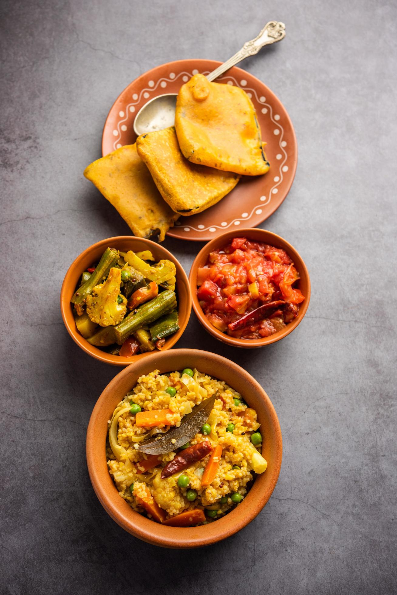 Bengali Bhog food for Indian Hindu Durga Puja or pooja festival. Khichadi, labra, tomato chutney Stock Free