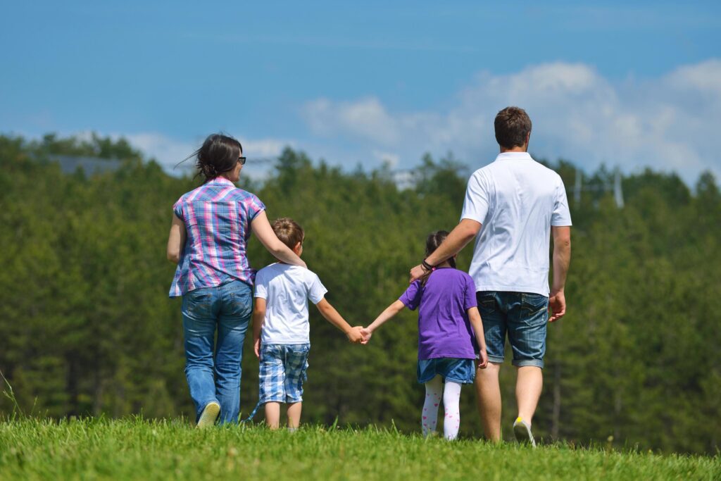 happy young family have fun outdoors Stock Free