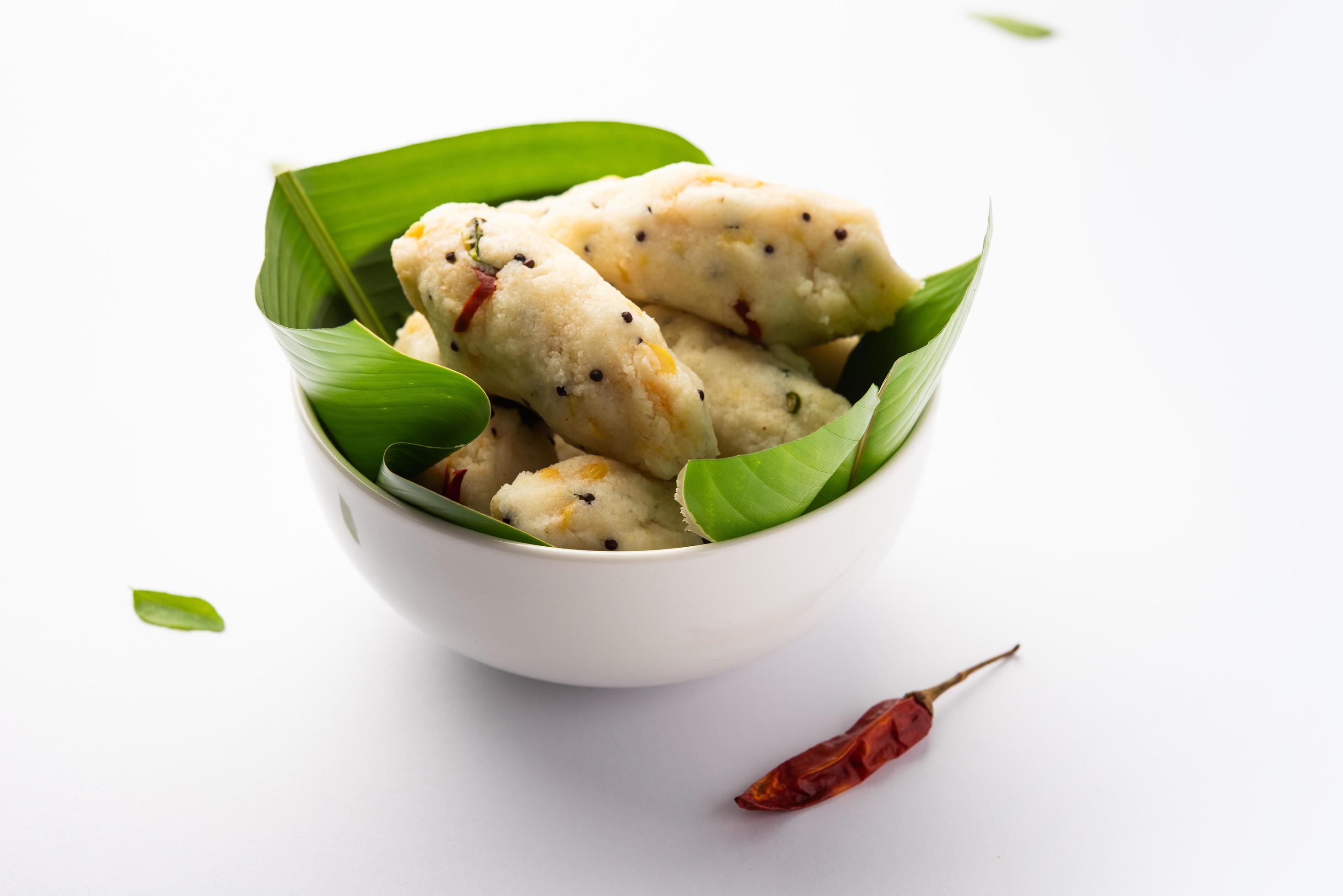 Kozhukatta Pidi is a steamed snack food from kerala rice flour with finger impressions Stock Free