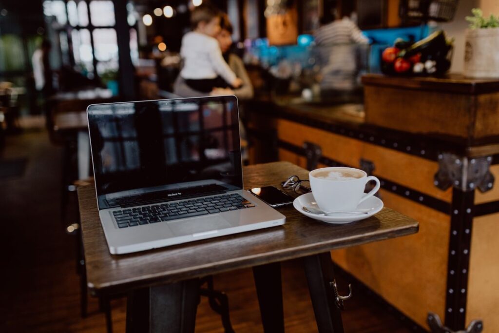 Cup of coffee on table in cafe Stock Free