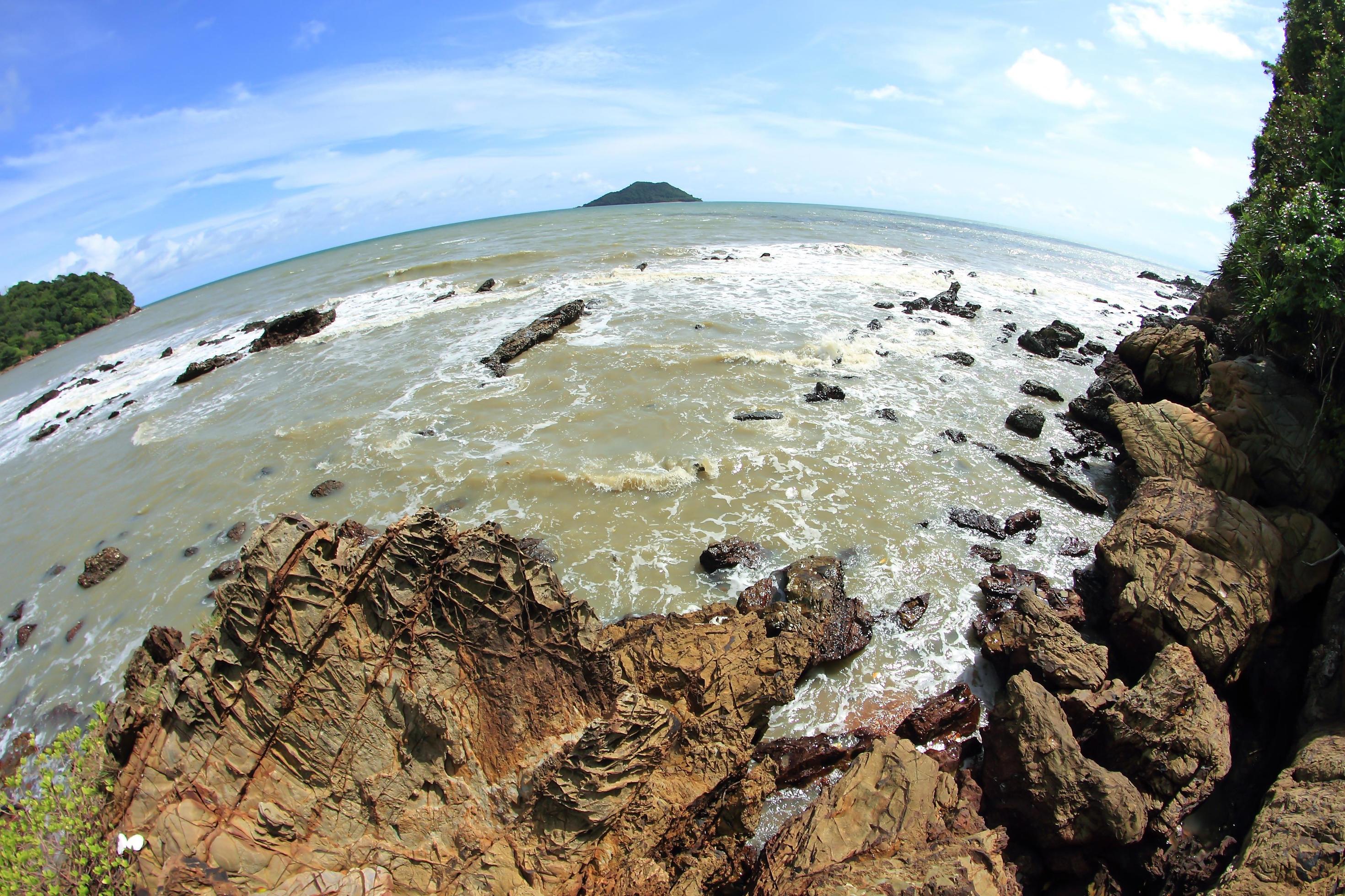 Beautiful seascape. Sea and rock . Nature composition. 8mm fish eye lens Stock Free